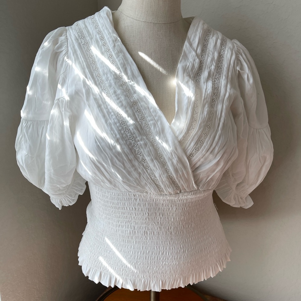 Do+BE White V-Neck Blouse with Ballon Sleeves with a feminine trim.  Small NWT